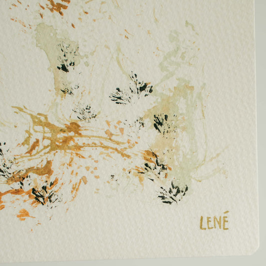Artistic abstract design with splashes of orange, black, and green on a light gray background, featuring the brand 'Lune'.