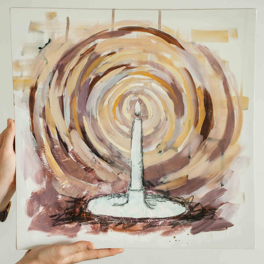 Abstract artwork with concentric light circles around a candle, held by a person.